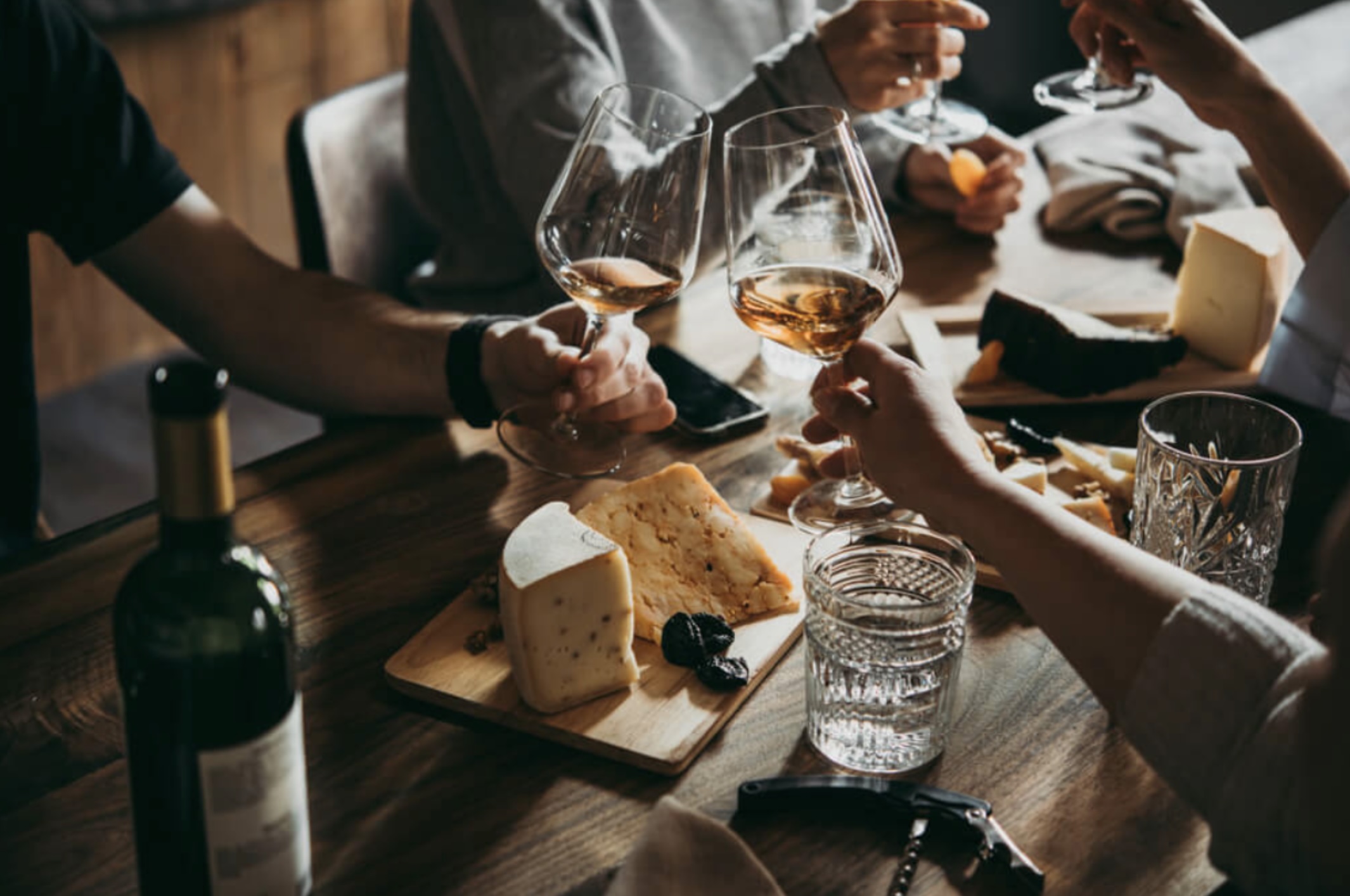 Cheers with a glass of wine